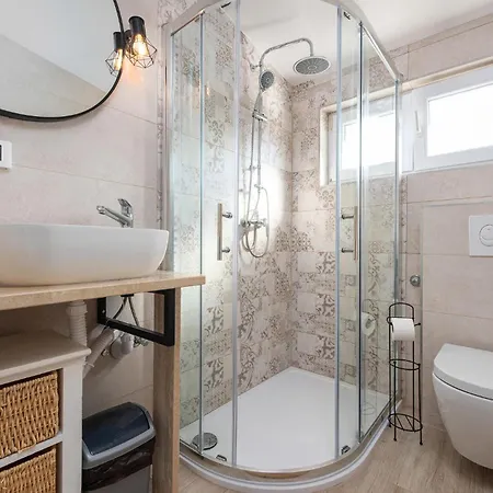 Holiday home Cozy In With Jacuzzi